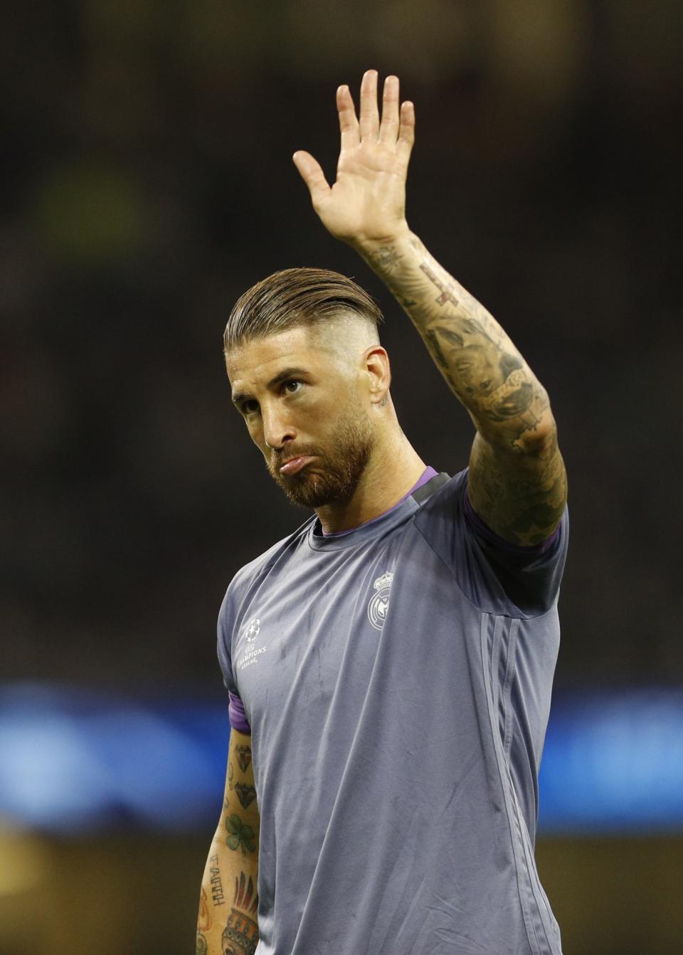 <p>Real Madrid’s Sergio Ramos warms up before the match </p>