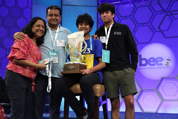 NATIONAL HARBOR, MARYLAND - JUNE 01:  Speller Dev Shah of Largo, Florida, celebrates with his father Deval Shah, mother Nilam Shah, and brother Neil Shah after he won the 2023 Scripps National Spelling Bee at Gaylord National Hotel and Convention Center on June 1, 2023 in National Harbor, Maryland. Shah correctly spelled the word 