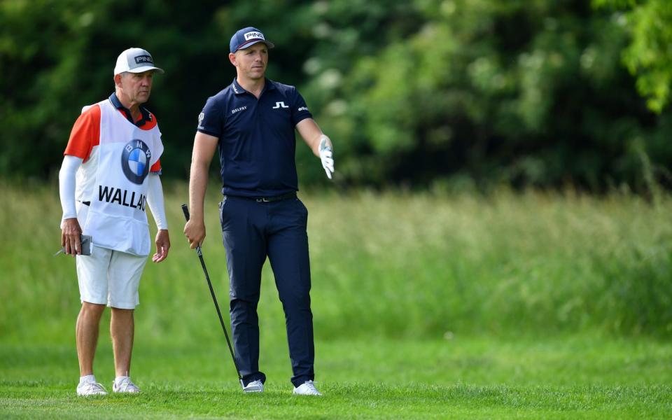 Wallace was seen remonstrating with caddie Dave McNeilly at the recent BMW International in Munich  - Getty Images Europe