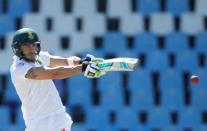 Cricket - New Zealand v South Africa - second cricket test match - Centurion Park, Centurion, South Africa - 28/08/2016. South Africa's captain Faf du Plessis plays a shot.REUTERS/Siphiwe Sibeko