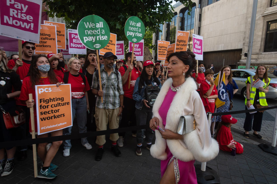 LONDON, ENGLAND - JUNE 20: Conservative party donors run the gauntlet of booing protestors as members of the PCS Trade Union whom work in the culture sector protest at The V&A against the building being used for a Conservative Party fundraiser on June 20, 2022 in London, England. The Public and Commercial Services Union (PCS) is made up of Government workers including civil servants. Earlier in the Spring, Boris Johnson announced 91,000 job cuts across the civil service with Secretaries of state asked to prepare plans for redundancies across their departments by 30 June. (Photo by Guy Smallman/Getty images)