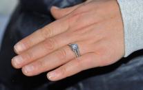 <p>Zara Tindall's engagement ring features a double pavé band and a round solitaire stone. </p>