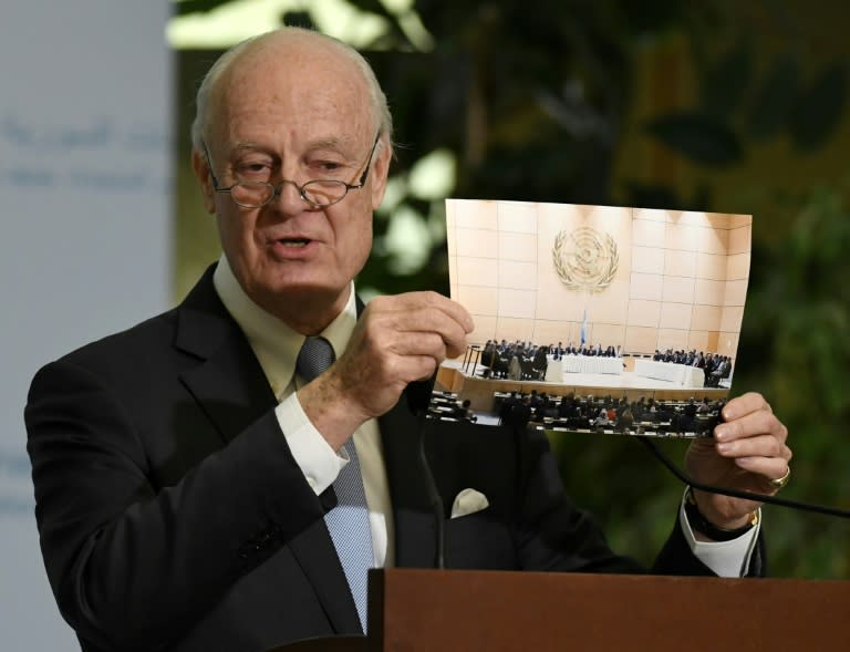 UN Special Envoy of the Secretary-General for Syria Staffan de Mistura shows a picture during a press conference as part of the Intra-Syrian peace talks at the European headquarters of the United Nations in Geneva, on March 3, 2017