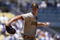 San Diego Padres starting pitcher MacKenzie Gore throws to the plate during the first inning of a baseball game against the Los Angeles Dodgers Sunday, July 3, 2022, in Los Angeles. (AP Photo/Mark J. Terrill)