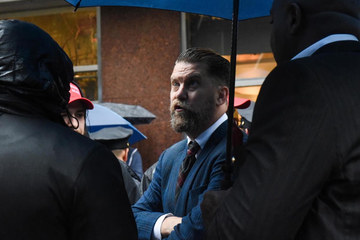 <span>Gavin McInnes protests against Linda Sarsour in New York on on 25 May 2017.</span><span>Photograph: Stephanie Keith/Getty Images</span>