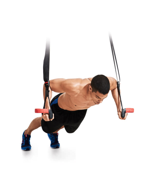 How to do it:<ol><li>Attach a suspension trainer to a sturdy overhead object and lengthen the straps to a point where you would do pushups.</li><li>Grasp the handles and get into pushup position with hands under your shoulders.</li><li>Your entire body should be straight and your core braced.</li><li>Bring your arms out to your sides as if you were giving someone a bear hug.</li><li>Lower your body until you feel a stretch in your chest and then bring your arms together again.</li><li>That’s one rep of the flye. Perform three reps.</li><li>Then, from the starting position, open your arms but keep your elbows bent so that the move looks like a combination of a pushup and a flye.</li><li>Press yourself back up.</li><li>That’s one rep of the bent-arm flye.</li><li>Perform three reps.</li><li>From there, return to the starting position and perform pushups on the handles.</li><li>All of the above equals one set.</li></ol>
