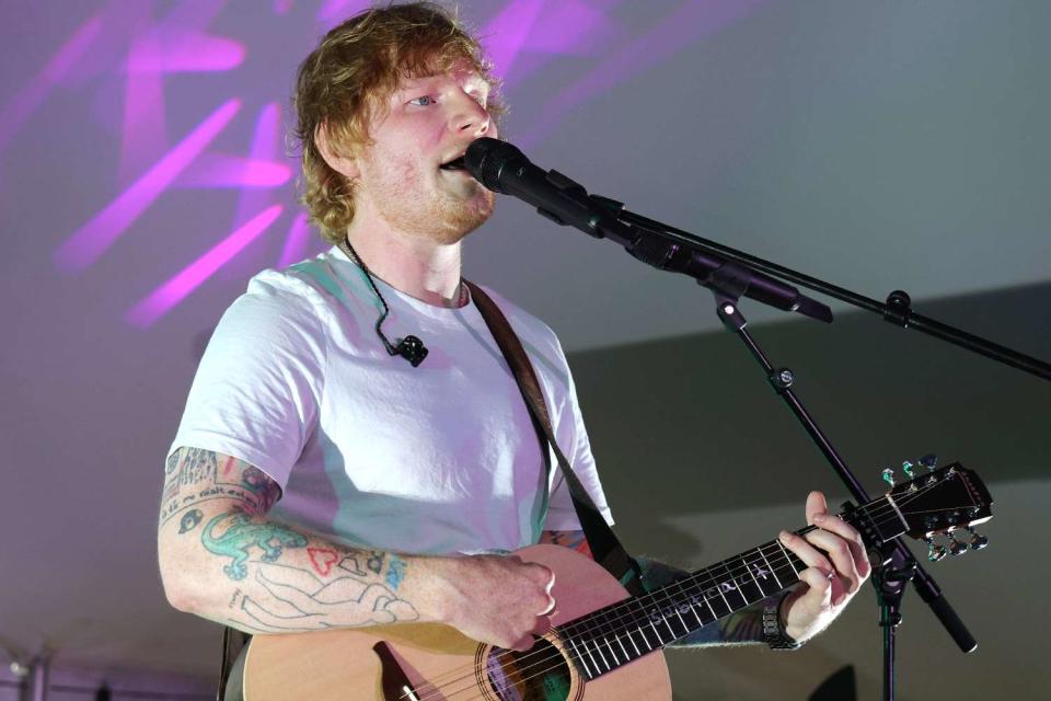 <p>Kevin Mazur/Getty</p> Ed Sheeran performs live for SiriusXM at the Stephen Talkhouse in Amagansett, New York.