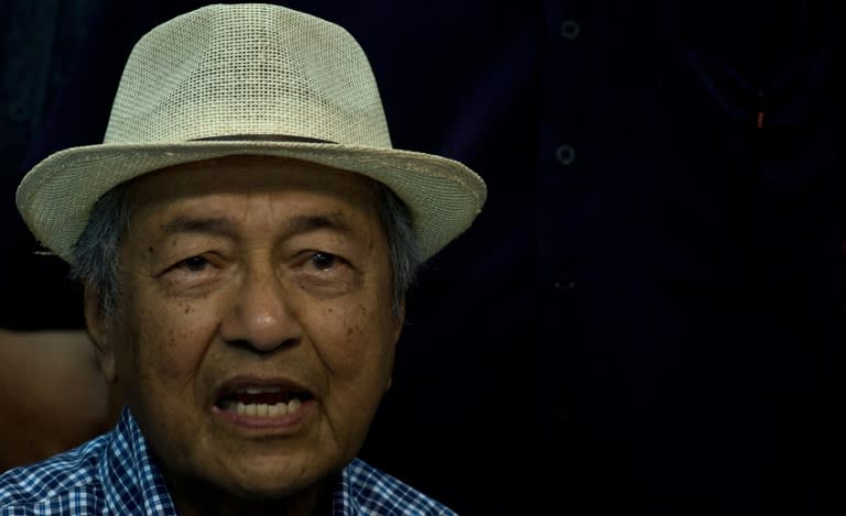 Former prime minister Mahathir Mohamad speaks with the media on the second day of the anti-government rally in Kuala Lumpur on August 30, 2015