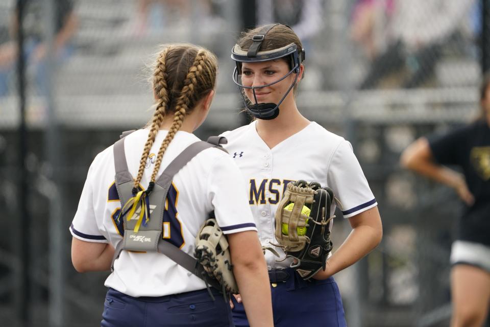 Ramsey pitcher Lucy Sobel, right, talks to catcher Kasey Oshalsky during the Bergen County softball semifinal against Bergen Tech on Sunday, May 21, 2023.