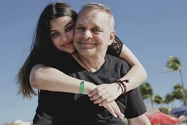 This photo provided by the Raanan family shows Natalie Raanan and her father, Uri Raanan, in Mexico. The Israeli government said Hamas militants on Friday, Oct. 20, 2023, freed two Americans -- Judith Raanan and her 17-year-old daughter Natalie, who had been held hostage in Gaza since militants rampaged through Israel two weeks ago. The pair, who also hold Israeli citizenship, were the first hostages to be released of the roughly 200 abducted. (Courtesy of the Raanan family via AP)