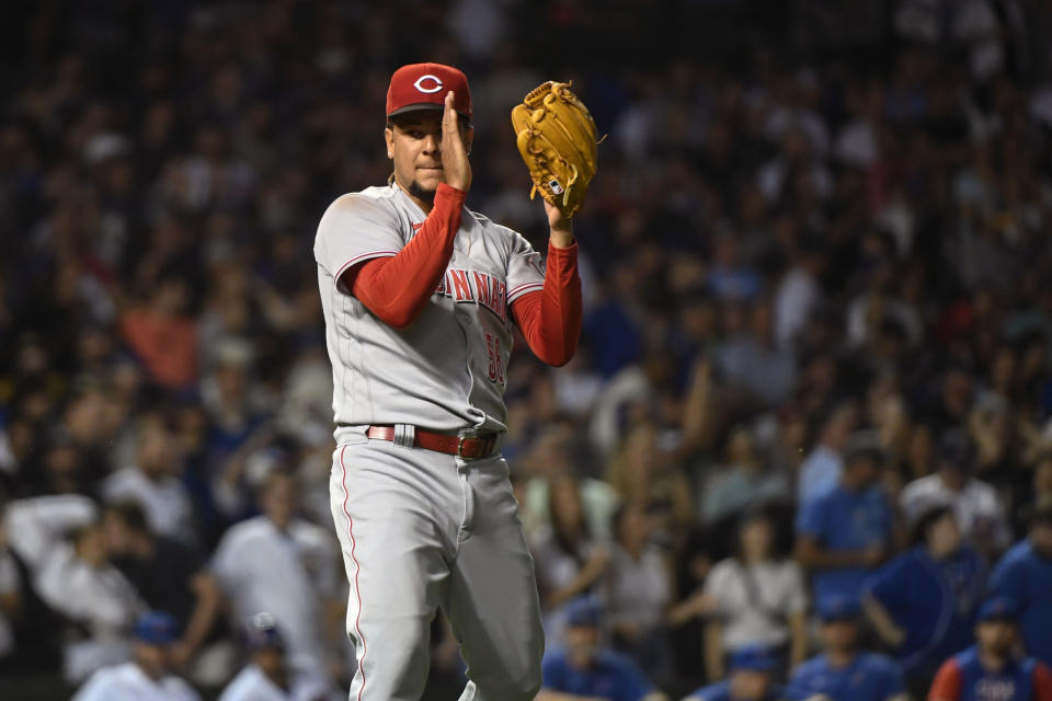 Cincinnati Reds starting pitcher Luis Castillo (58) reacts after closing out the sixth inning of a baseball game against the Chicago Cubs in Chicago, Tuesday, June 28, 2022. (AP Photo/Matt Marton)