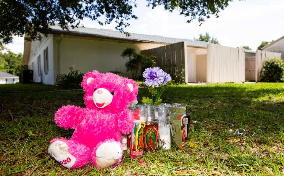 A makeshift memorial for the late Ajike "AJ" Shantrell Owens rests on the ground near where Owens died from a gun shot at Quail Run, almost a week after the fatal shooting. Owens was shot while standing outside her neighbor's door the night of June 2 in Quail Run, located off County Road 475A in Ocala. Quail Run consist of single story duplex and quadraplex. Susan Louise Lorincz, 58, now faces charges of manslaughter with a firearm, culpable negligence, two counts of assault and battery. [Doug Engle/Ocala Star Banner]2023