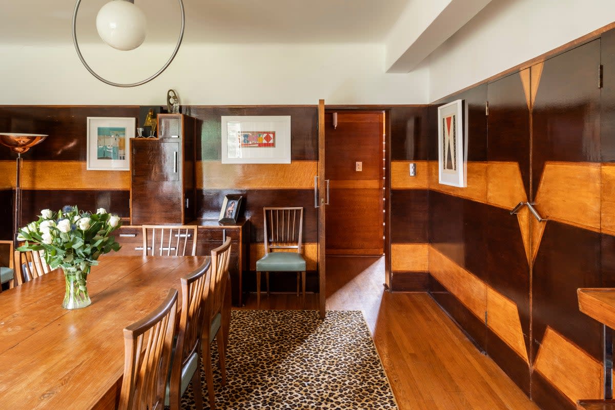 Contrast wood panelling in the dining room (The Modern House)