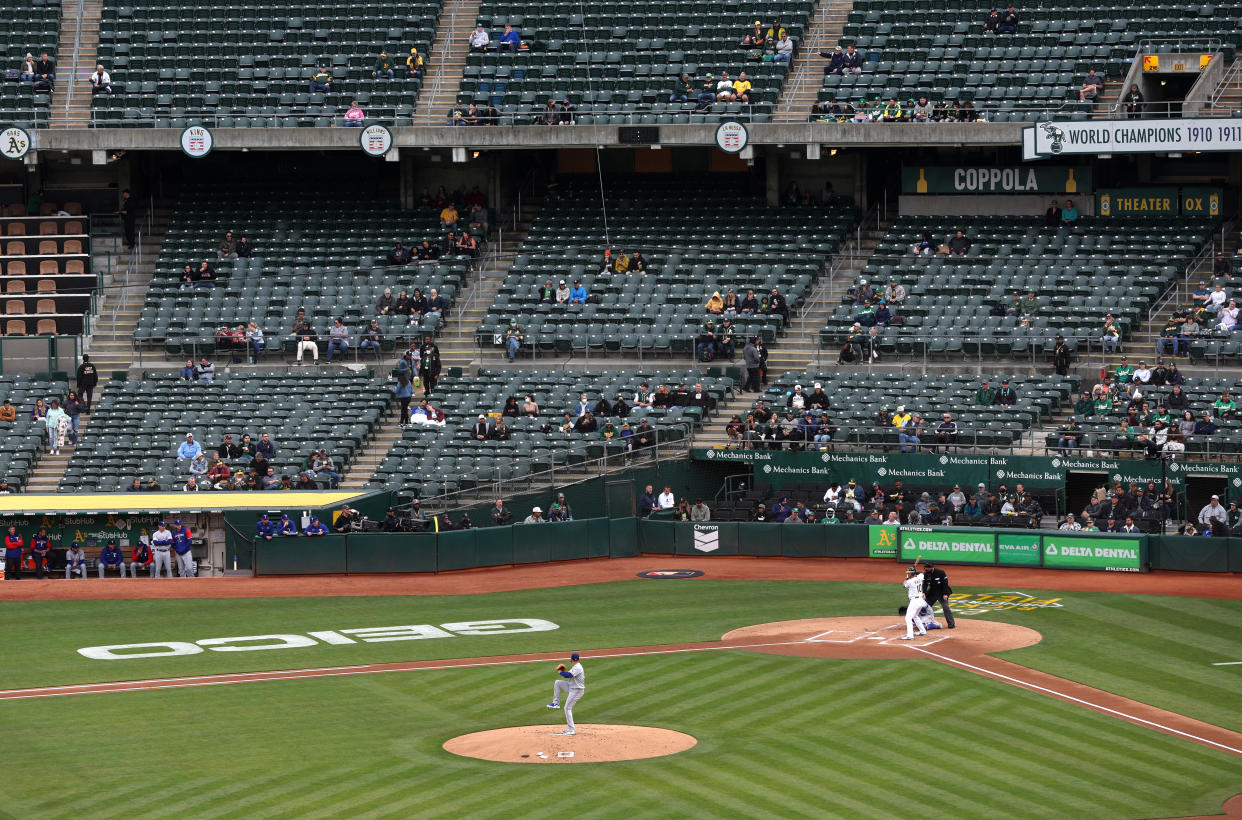 OAKLAND, CALIFORNIA - MAY 26: Rows of seats sit empty as the Oakland Athletics play the Texas Rangers at RingCentral Coliseum on May 26, 2022 in Oakland, California. Attendance at Oakland Athletics baseball games have dwindled to historic lows as the team has traded away fan favorite players and continues to explore moving the team to Las Vegas if they can't reach a deal to build a new stadium near the Port of Oakland. The Athletics have the lowest attendance of all 30 Major League Baseball (MLB) as well as the league's lowest single game attendance for a May 2nd game that only drew 2,488 fans. (Photo by Justin Sullivan/Getty Images)