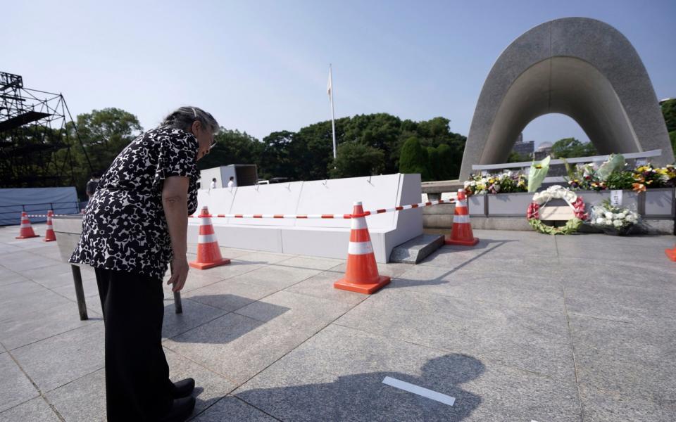 Koko Kondo prays at the cenotaph for the atomic bombing victims - Eugene Hoshiko /AP