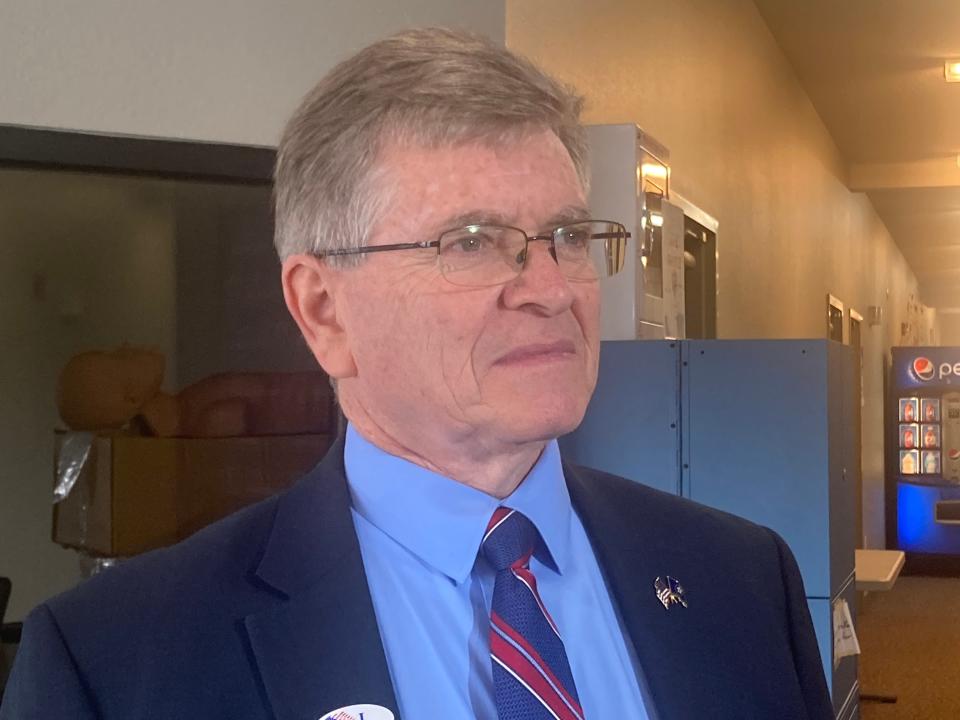 Mayor Jim Langfelder faces the media at Lutheran High School on S. Sixth St. Frontage Road after casting his ballot Tuesday morning.