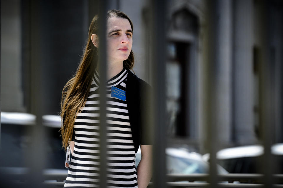 Rep. Zooey Zephyr, D-Missoula, stands on the steps of the Montana State Capitol during a rally, in Helena, Mont., Monday, April 24, 2023. Republican legislative leaders in Montana persisted in forbidding the Democratic transgender lawmaker from participating in debate for a second week as her supporters brought the House session to a halt Monday, chanting "Let her speak!" from the gallery before they were escorted out. (Thom Bridge/Independent Record via AP)