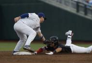 Jun 21, 2018; Omaha, NE, USA; Florida Gators second baseman Blake Reese (12) tags out Texas Tech Red Raiders second baseman Brian Klein (5) in the third inning in the College World Series at TD Ameritrade Park. Mandatory Credit: Bruce Thorson-USA TODAY Sports