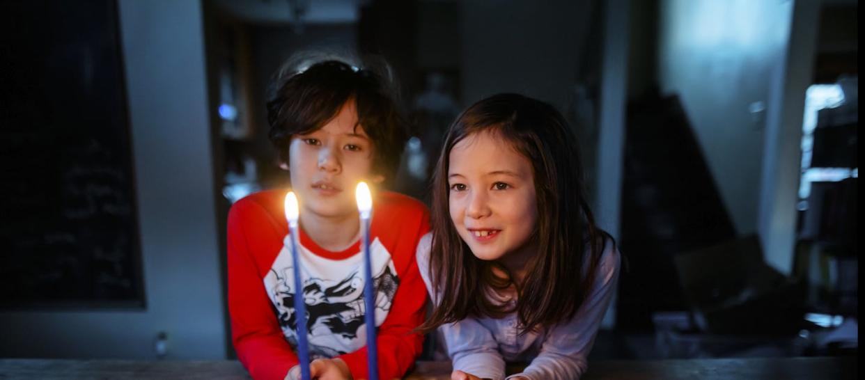 May is a reminder of how diverse two American communities are. <a href="https://www.gettyimages.com/detail/photo/two-children-sit-at-table-together-looking-at-lit-royalty-free-image/1455508903?phrase=chinese+jewish&adppopup=true" rel="nofollow noopener" target="_blank" data-ylk="slk:Cavan Images via Getty Images;elm:context_link;itc:0;sec:content-canvas" class="link ">Cavan Images via Getty Images</a>