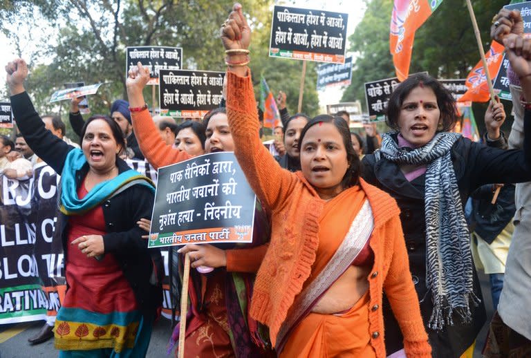 Activists from India's main opposition Bharatiya Janata Party shout slogans during a protest march to the Pakistani embassy, decrying the killing of two Indian soldiers, in New Delhi on January 9, 2012. India delivered a dressing-down Wednesday to Islamabad's envoy as it accused Pakistan's army of beheading one of two soldiers killed in Kashmir, but both sides warned against inflaming tensions