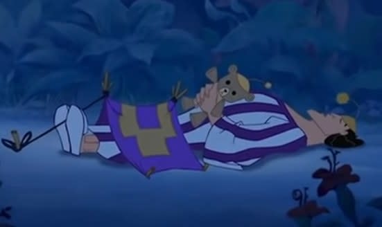 Kronk from The Emperor's New Groove sleeps with a tent over his lap