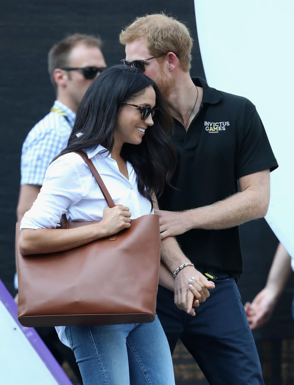 Harry and Meghan held hands on the first day of the Games. Source: Getty