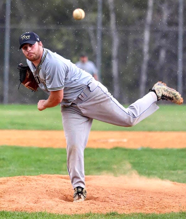 Former Western Wayne pitching ace Kyle Rizzi deals to the dish during the first-ever Alumni Baseball Game. Rizzi (Class of 2000) earned the decision in a rain-shortened 7-2 victory for the "Old Guys."