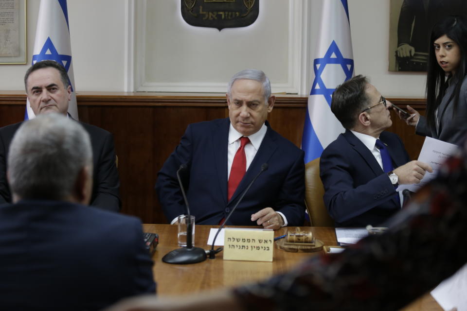 Israeli Prime Minister Benjamin Netanyahu, center, ‏convenes his cabinet for weekly meeting in Jerusalem, Sunday, Jan. 13, 2019. (AP Photo/Ariel Schalit, Pool)
