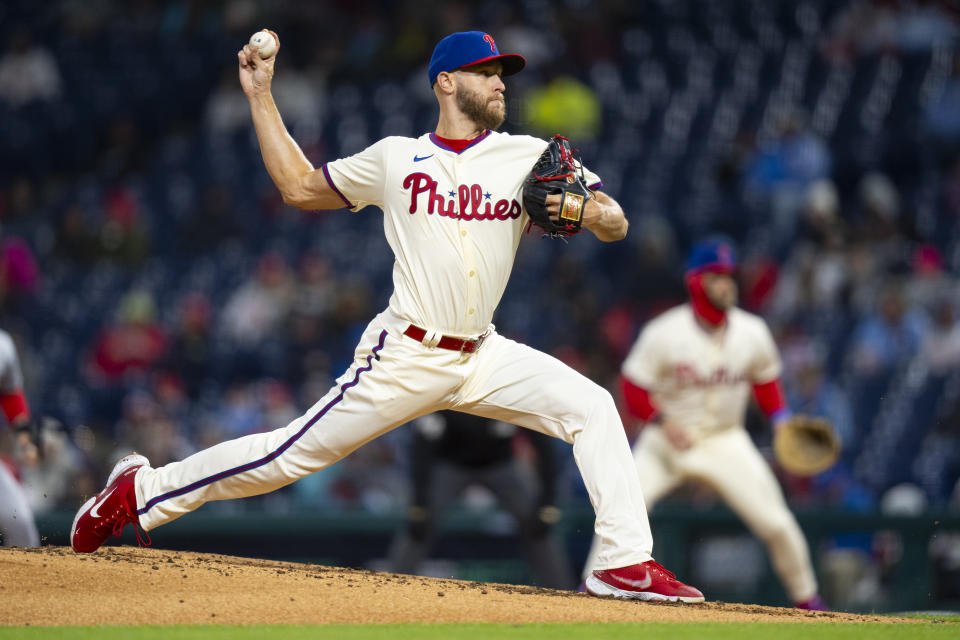 Philadelphia Phillies starting pitcher Zack Wheeler delivers during the third inning of the team's baseball game against the Cincinnati Reds, Wednesday, April 3, 2024, in Philadelphia. (AP Photo/Chris Szagola)