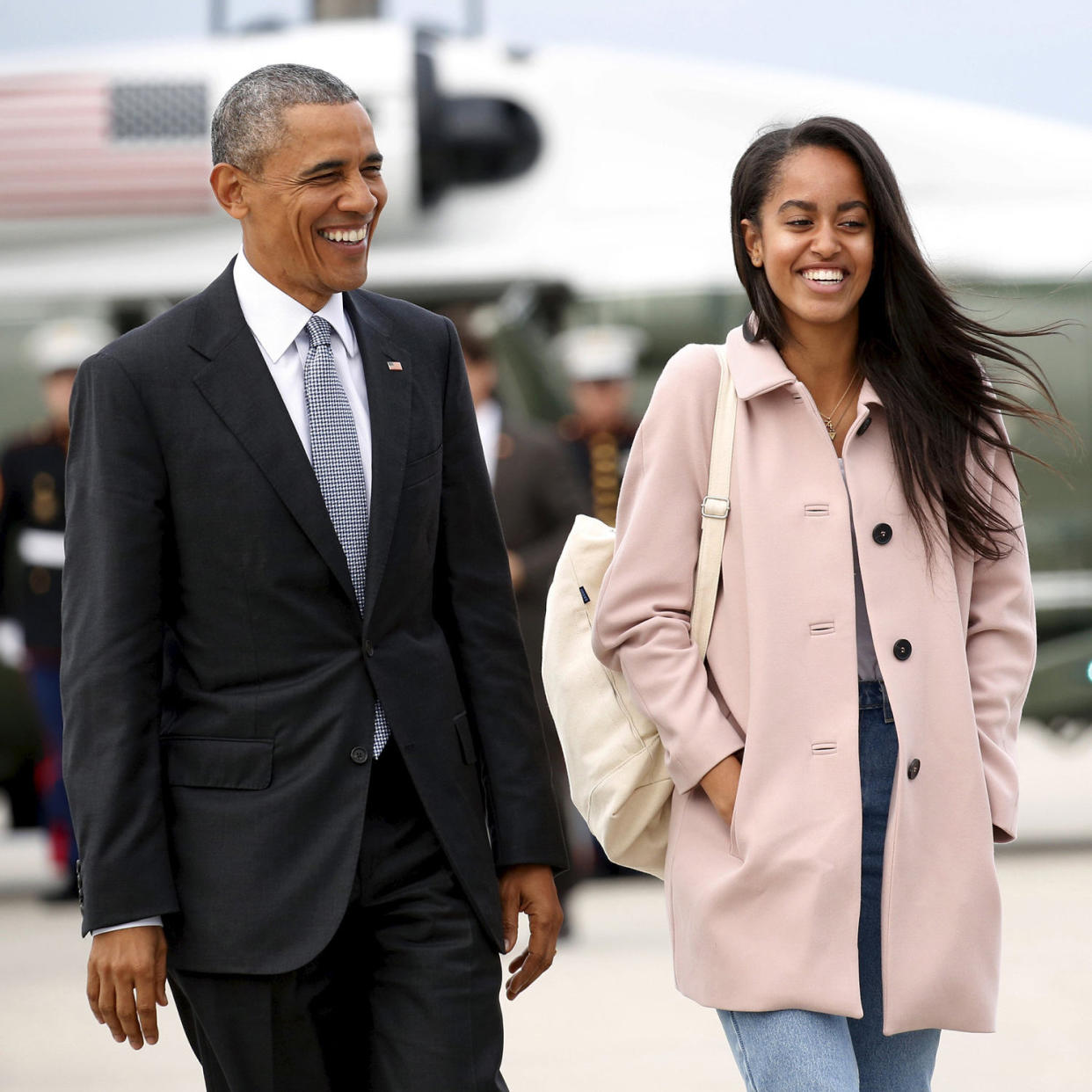 Image: U.S. President Barack Obama and his daughter Malia walk from Marine One to board Air Force One upon their departure from O'Hare Airport in Chicago (Kevin Lamarque / REUTERS)