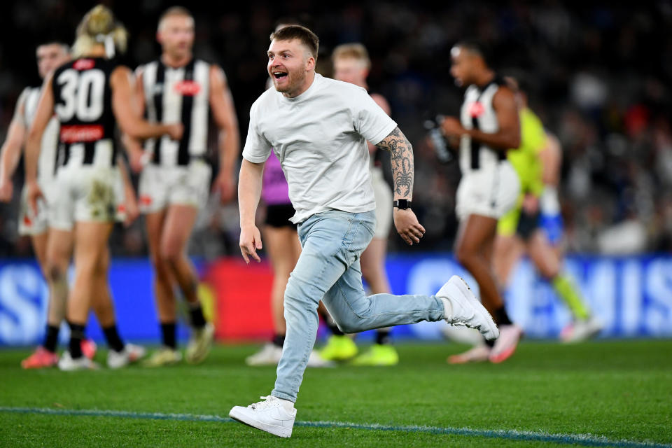 The man, pictured here on the field during Collingwood's clash with North Melbourne.