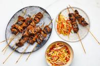 Sweet, spicy, and aromatic, these vibrantly delicious galangal-and-lemongrass–marinated beef skewers are a Cambodian street food staple. They’re also ideal for a quick dinner. If you don’t have a grill, you can always broil on a sheet pan. <a href="https://www.bonappetit.com/recipe/sach-ko-ang?mbid=synd_yahoo_rss" rel="nofollow noopener" target="_blank" data-ylk="slk:See recipe." class="link ">See recipe.</a>