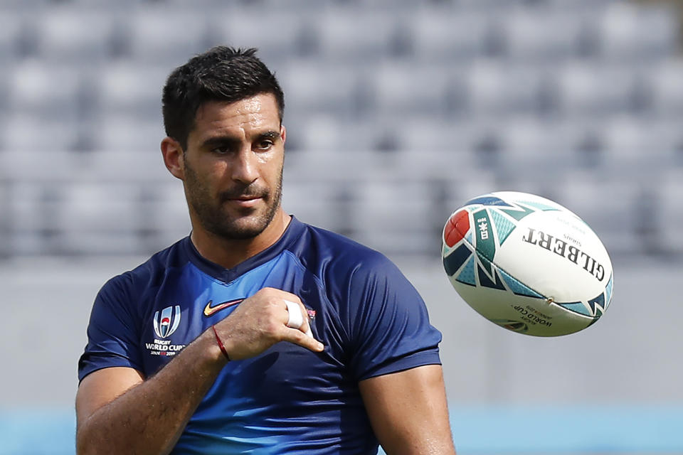 Argentina's Jeronimo de la Fuente throws a ball during their captain's run prior to the Rugby World Cup in Tokyo, Japan, Thursday, Sept. 19, 2019. (AP Photo/Eugene Hoshiko)