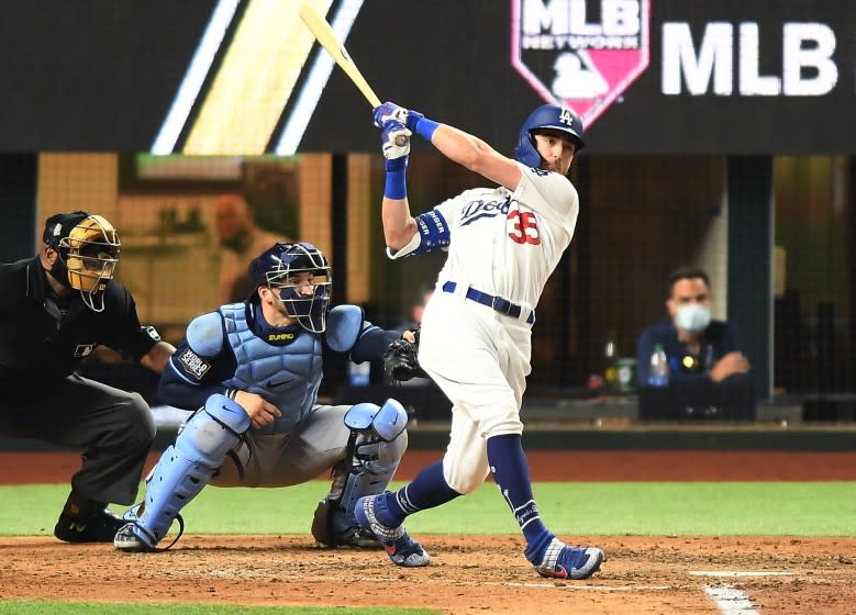 ARLINGTON, TEXAS OCTOBER 20, 2020-Dodgers Cody Bellinger hits a two-run home run against the Rays in the 4th inning in Game 1 of the World Series at Globe Life Field in Arlington, Texas Tuesday. (Wally Skalij/Los Angeles Times)