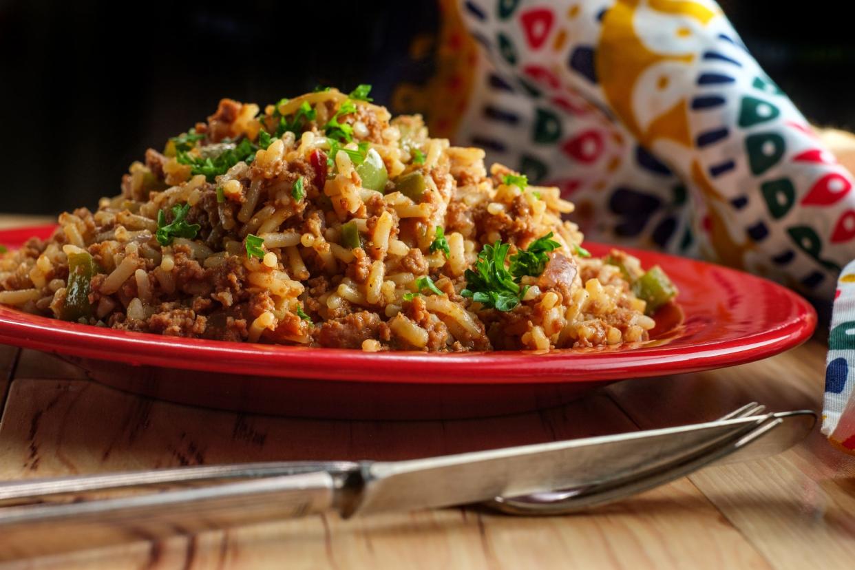 Mexican style Spanish rice with tomatoes onions and green bell peppers