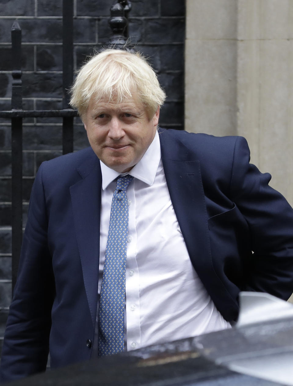 Britain's Prime Minister Boris Johnson leaves 10 Downing Street in London, Thursday, Sept. 26, 2019. An unrepentant Prime Minister Boris Johnson brushed off cries of "Resign!" and dared his foes to try to topple him Wednesday at a raucous session of Parliament, a day after Britain's highest court ruled he acted illegally in suspending the body ahead of the Brexit deadline. (AP Photo/Kirsty Wigglesworth)
