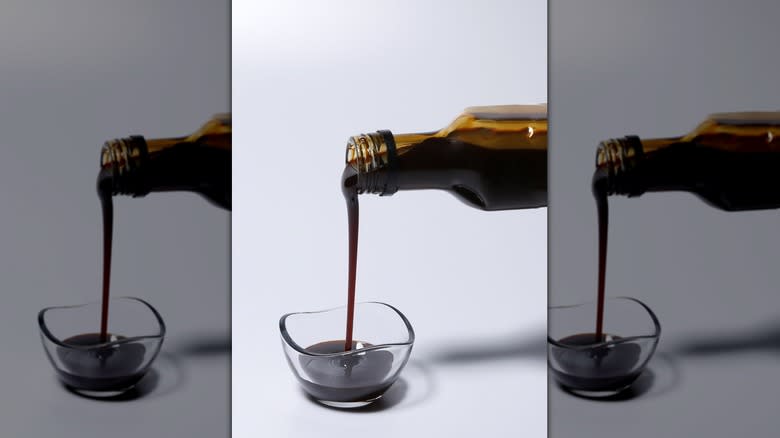 pouring pomegranate molasses