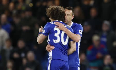 Britain Football Soccer - Chelsea v Southampton - Premier League - Stamford Bridge - 25/4/17 Chelsea's John Terry celebrates after the match with David Luiz Reuters / Stefan Wermuth Livepic