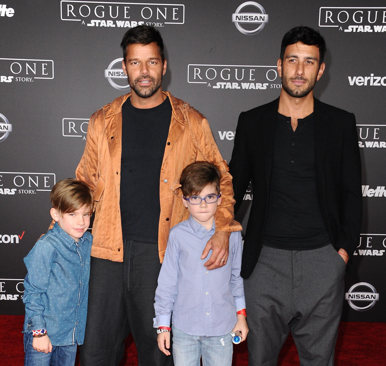 HOLLYWOOD, CA - DECEMBER 10:  Recording artist Ricky Martin (2nd L), artist Jwan Yosef (R), and sons Matteo Martin and Valentino Martin attend the premiere of 