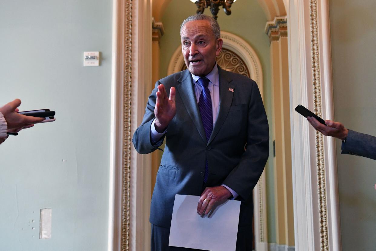 US Senate Majority Leader Chuck Schumer (C) addresses the press on the infrastruture package at the US Capitol, in Washington, DC on July 28, 2021. (Nicholas Kamm/AFP via Getty Images)