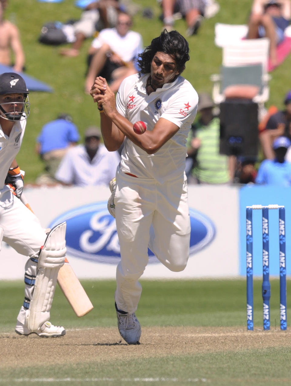 India’s Ishant Sharma attempts a caught and bowled of New Zealand’s Brendon McCullum on the third day of the second cricket test at Basin Reserve in Wellington, New Zealand, Sunday, Feb. 16, 2014. (AP Photo/SNPA, Ross Setford) NEW ZEALAND OUT