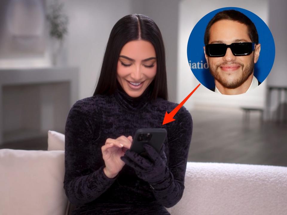 kim kardashian looking at her phone and smiling, with a small circular cutout of pete davidson in the corner and an arrow pointing from pete to kim's phone