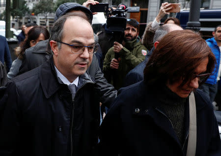 Catalan politician Jordi Turull arrives to the Supreme Court after being summoned and facing investigation for his part in Catalonia's bid for independence in Madrid, Spain, March 23, 2018. REUTERS/Juan Medina