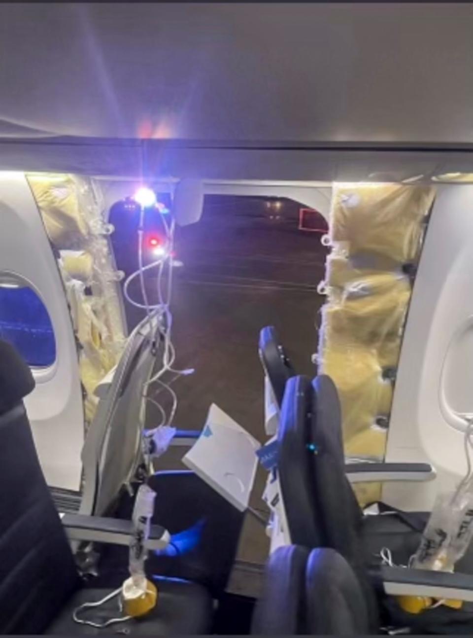 This photo provided by an unnamed source shows the damaged part of an Alaska Airlines Boeing 737 Max 9, Flight 1282, which was forced to return to Portland International Airport on Friday, Jan. 5, 2024.