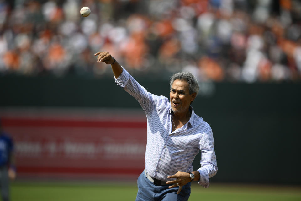 Former Baltimore Orioles player Dennis Martinez throws out the ceremonial first pitch before a baseball game against the Kansas City Royals, Saturday, June 10, 2023, in Baltimore. (AP Photo/Nick Wass)