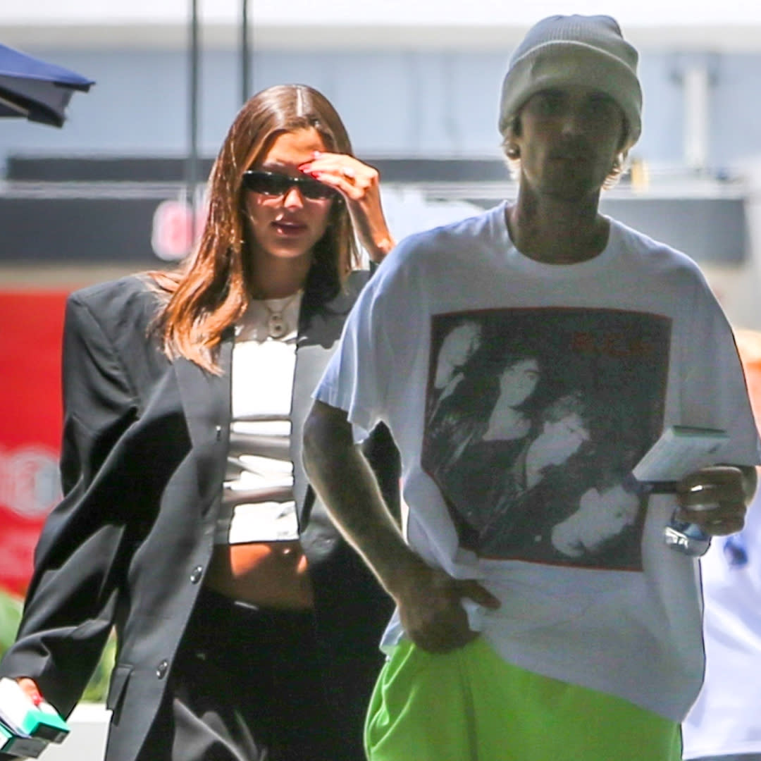  Hailey Bieber and Justin Bieber walking in Los Angeles where Hailey's pregnancy is visible. 