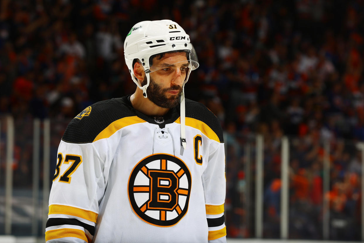 UNIONDALE, NEW YORK - JUNE 05: Patrice Bergeron #37 of the Boston Bruins skates against the New York Islanders in Game Four of the Second Round of the 2021 Stanley Cup Playoffs at Nassau Coliseum on June 05, 2021 in Uniondale, New York. New York Islanders defeated the Boston Bruins 4-1. (Photo by Mike Stobe/NHLI via Getty Images)