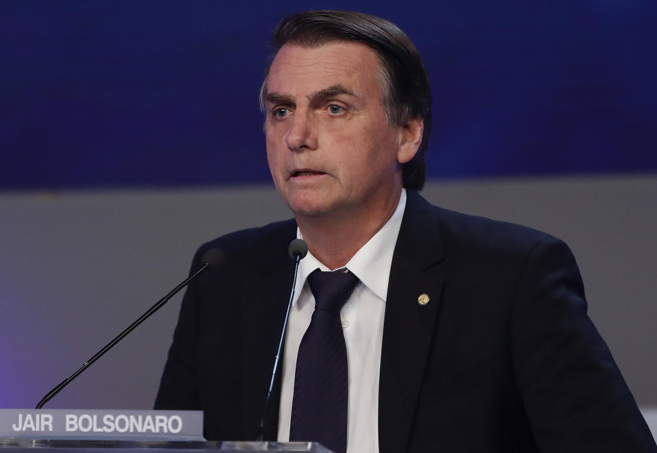 Jair Bolsonaro, who is running for president with the National Social Liberal Party, attends a presidential debate in Sao Paulo, Brazil, Thursday, Aug. 9, 2018. Brazil will hold general elections on Oct. 7. (AP Photo/Andre Penner)