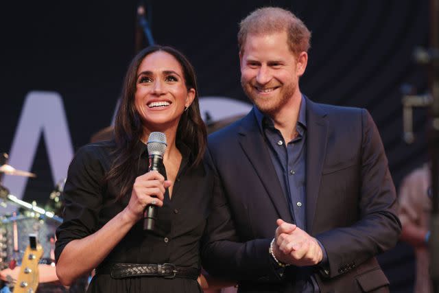 <p>Chris Jackson/Getty for the Invictus Games Foundation</p> Meghan Markle joined Prince Harry at the Invictus Games' Family & Friends party on Sept. 12