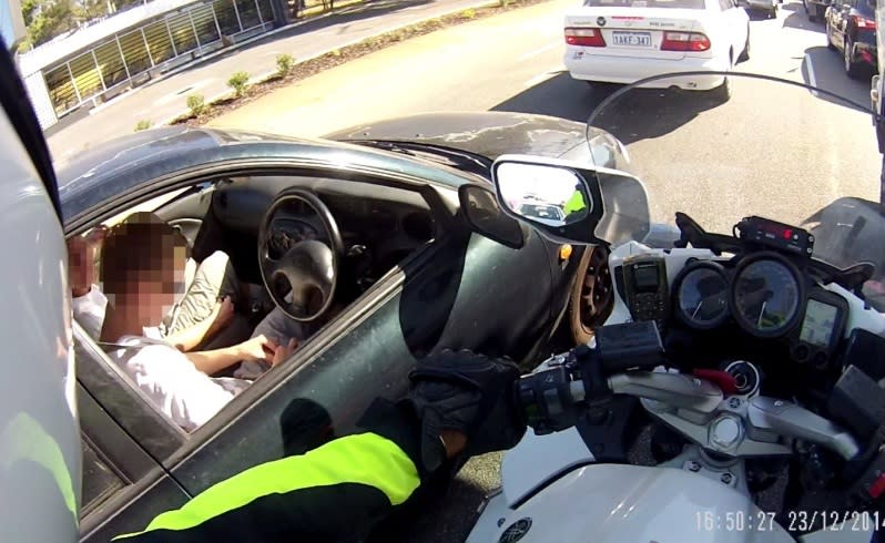 This driver was caught allegedly rolling a joint. Picture: WA Police